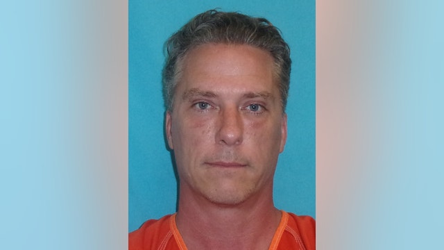 Armed hostage taker, who fired at officers, under arrest