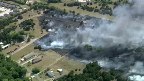 Grass fire burns close to homes in Glenn Heights