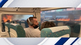 Video captures 'moments of panic' when Spanish train was surrounded by wildfire