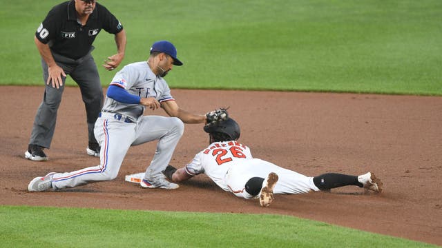 Orioles outlast Rangers 10-9 on Mullins' double in 10th