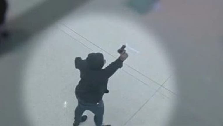 Surveillance, body cam video shows Dallas PD confront shooter at Dallas Love Field Airport