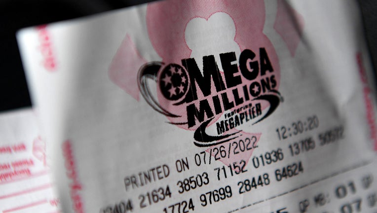 This illustration photo shows a Mega Millions lottery ticket on July 26, 2022. (Photo by OLIVIER DOULIERY/AFP via Getty Images)