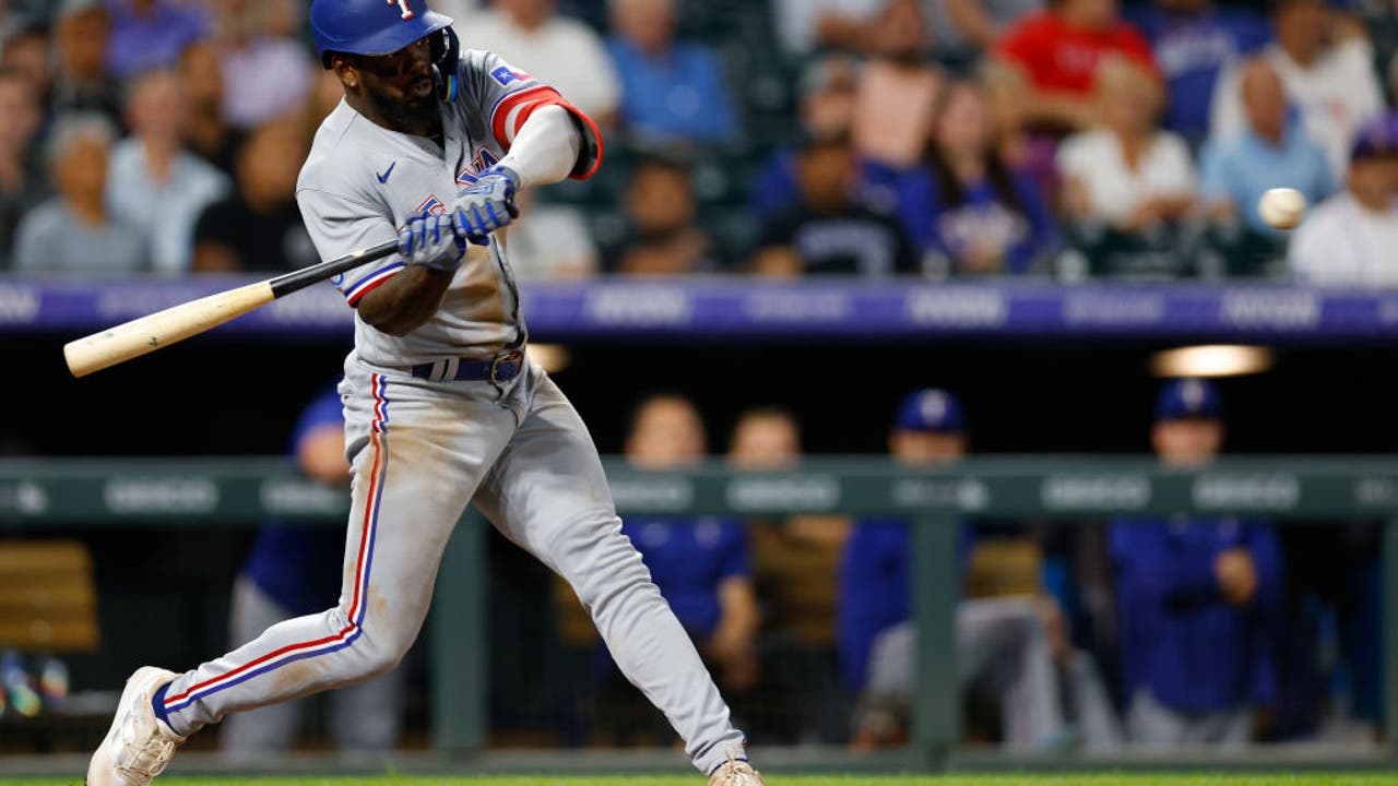 Martin Perez, Adolis Garcia lead Rangers past Rockies