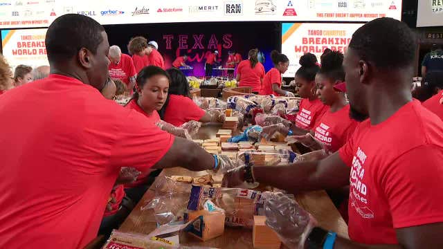 Thousands pack Texas Live! for the 'longest line of sandwiches' charity event