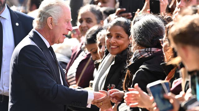 King Charles, Prince William greet mourners lined up to view queen's coffin