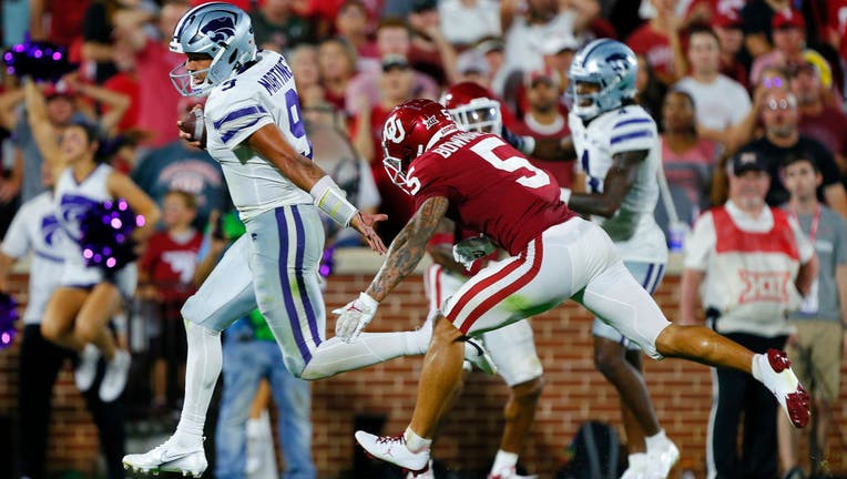 Kansas State stuns No. 6 Oklahoma behind Adrian Martinez's 5