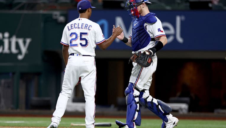 Texas Rangers' Josh Smith takes a lead off of second during the