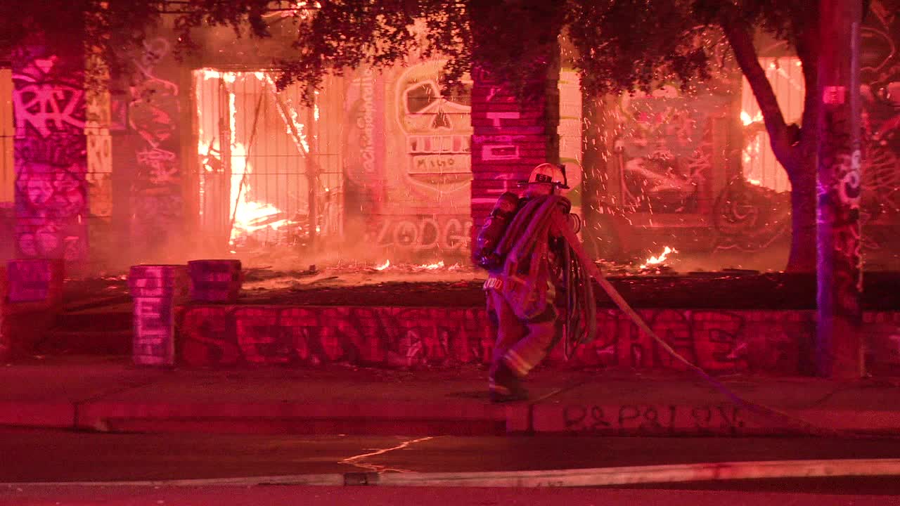 Firefighters battle blaze near Dallas graffiti park Firefighters battle blaze near Dallas graffiti park