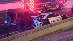 2 Dallas police officers hospitalized after patrol vehicle struck