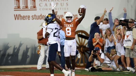 Card to Worthy connections lead Texas over WVU 38-20