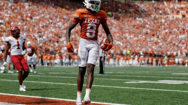 No. 22 Texas overcomes upset bid by Iowa State 24-21