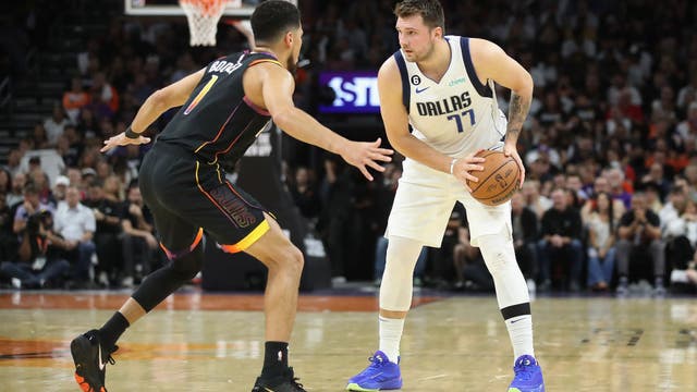 Mavericks blow 22 point lead, lose to Suns 107-105