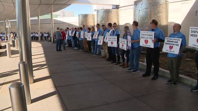 Dispatchers picket outside of Dallas Love Field ahead of Christmas travel season