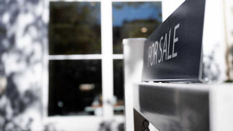 FILE - A residential real estate for sale sign is seen as inflation and interest rates increase on Oct. 27, 2022, in Washington, DC. (Photo by BRENDAN SMIALOWSKI/AFP via Getty Images)