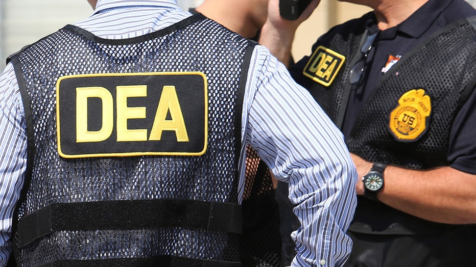 DEA agents at a crime scene.