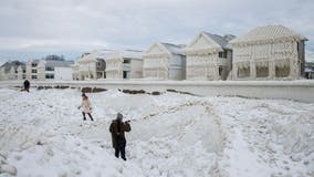 Lakefront neighborhood transforms into surreal frozen wonderland after blizzard's onslaught