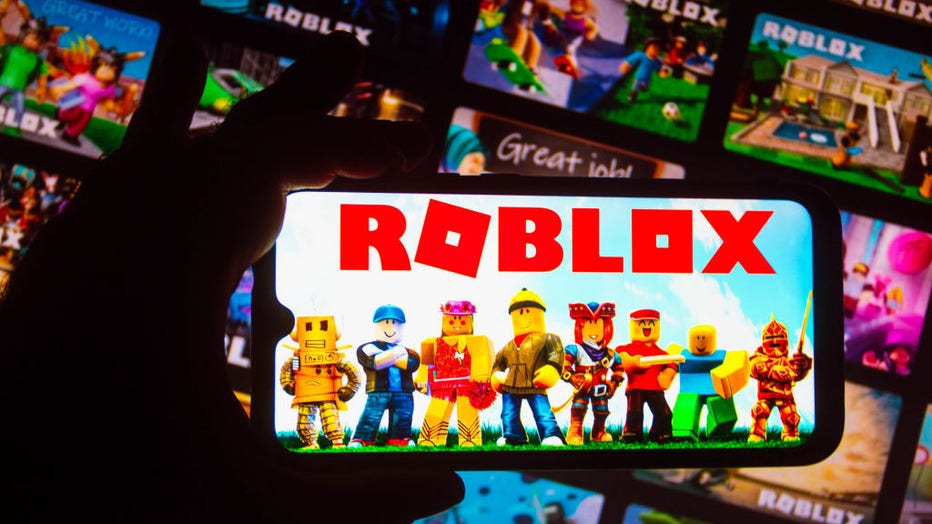 In this photo illustration, the Roblox logo is seen displayed on a smartphone. (Photo Illustration by Rafael Henrique/SOPA Images/LightRocket via Getty Images)