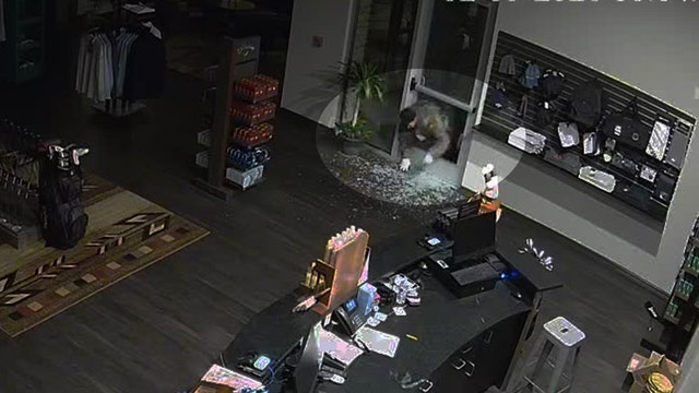 VIDEO: Fort Worth burglars caught on camera crawling through glass door, stealing cash from golf course