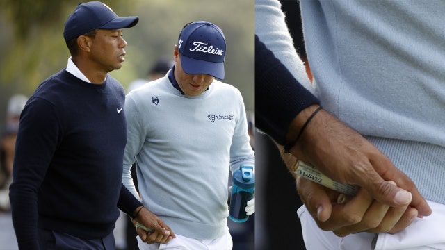 Tiger Woods appears to hand Justin Thomas a tampon after outdriving him at Genesis Invitational