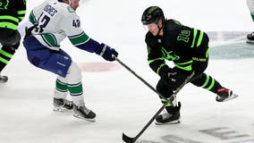 Boeser helps Canucks top Stars 3-1