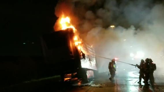Trailer filled with frozen chicken catches fire on I-30 in Dallas