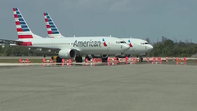 American Airlines flight attendants picket for higher pay, better hours