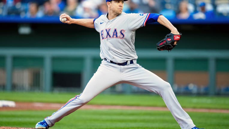 Rangers blank Royals 4-0 after deGrom exits with sore wrist