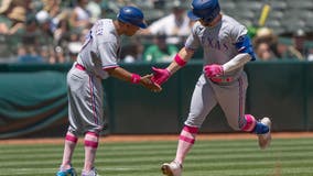 García slam, 5 RBIs lead Rangers to 11-3 win