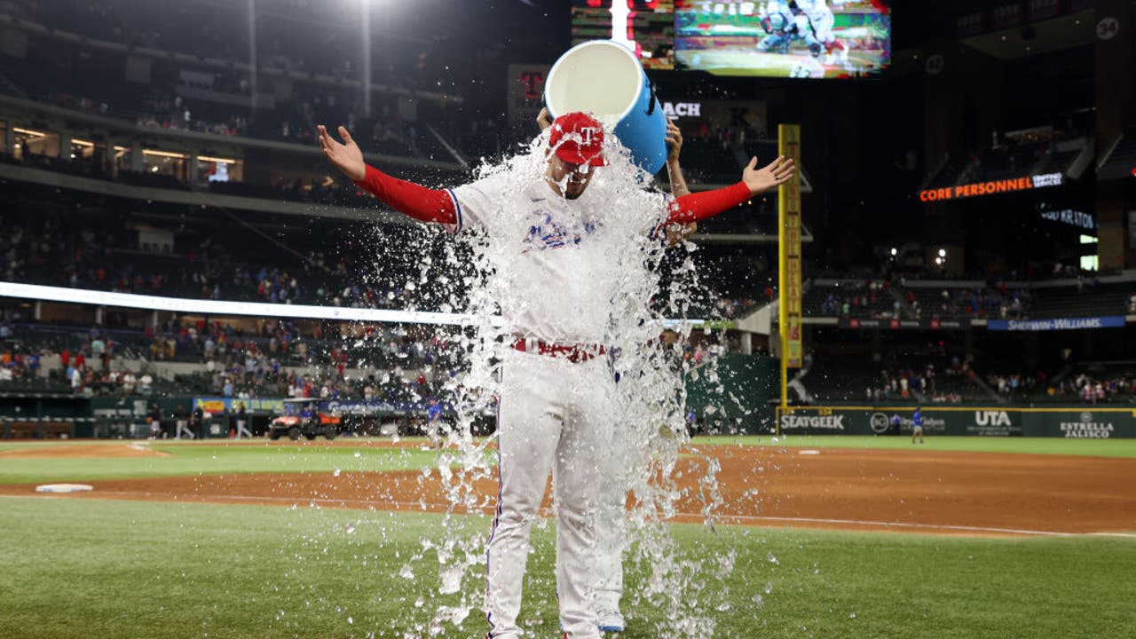 Dane Dunning comes within an out of his first shutout, the Rangers beat the  Tigers 10-2