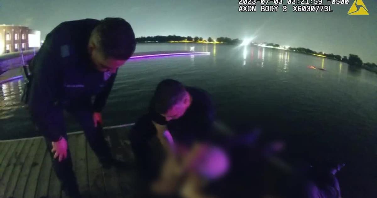 Dallas police officers rescue woman from submerged vehicle: 'It was ...