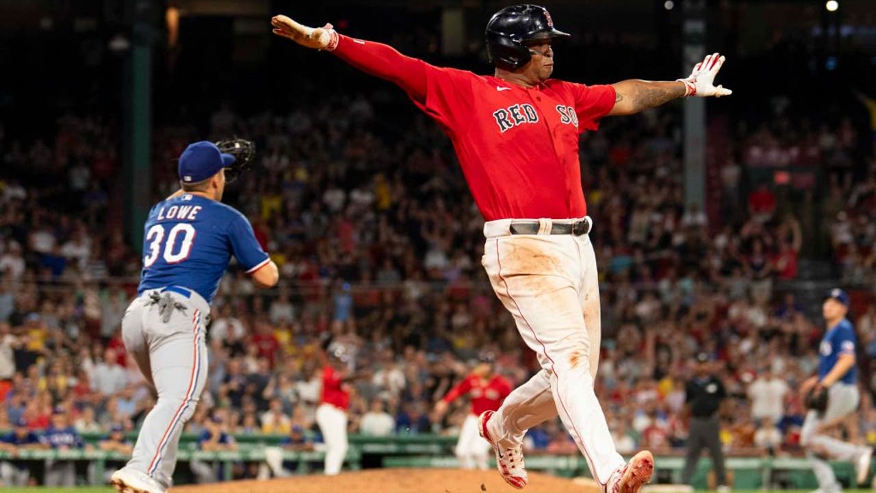 Masataka Yoshida of the Boston Red Sox reacts after hitting a two run  News Photo - Getty Images