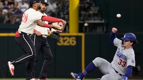 Freeman hits 2 of the Dodgers' 5 HRs as they rout the Rangers 16-3 in matchup of division leaders