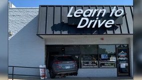 Instructor at Colorado driving school plows through front of business' building