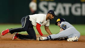 Santana's 3-run homer in the 7th leads Brewers past Rangers