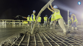 North Texas construction crew works overnight because heat could cause problems with cement