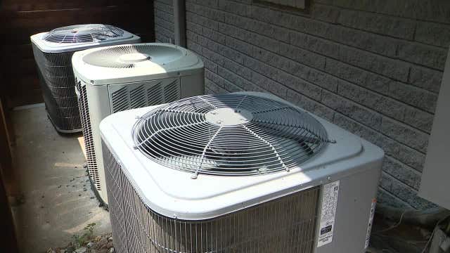 Dallas code compliance officers checking A/C units as we deal with hottest temperatures of the year