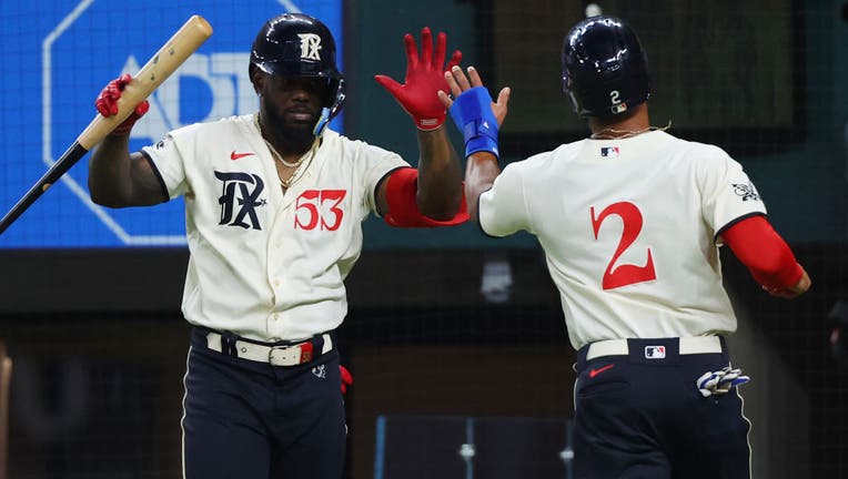 Garcia drives in 4, Rangers beat Braves 7-3 to take series