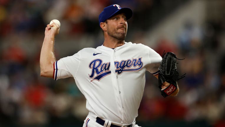 Scherzer strikes out 9 in Rangers debut