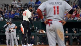 Twins rally to beat slumping Rangers 9-7 in 10 innings