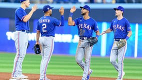 Heim launches grand slam, Carter hits 1st career home run as the Rangers beat the Blue Jays 10-4