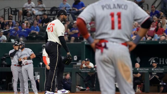 Twins rally to beat slumping Rangers 9-7 in 10 innings