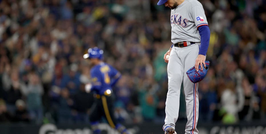 Mariners rebound from first-inning triple play to beat the Rangers