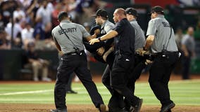 World Series: Fan runs onto Chase Field, carried off by security