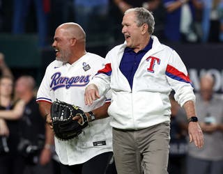 George W. Bush bounces ceremonial first pitch at Game 1 of  Rangers-Diamondbacks World Series