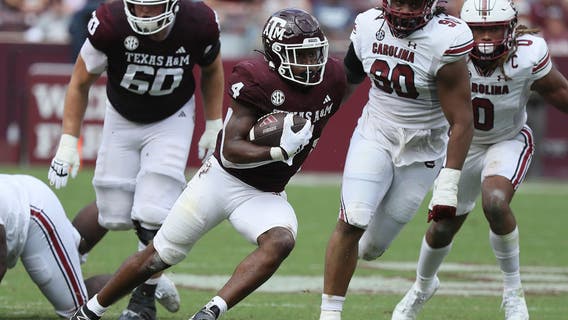 Johnson throws for 249 yards and TD as Texas A&M gets 30-17 win over South Carolina