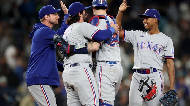 Rangers get 6-1 win over Mariners to clinch playoff spot