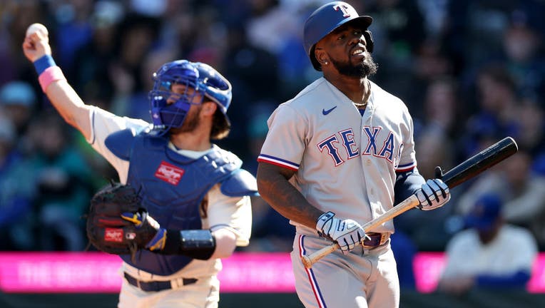 Rangers score 13 runs in finale win over Astros