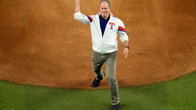 George W. Bush bounces ceremonial first pitch at Game 1 of  Rangers-Diamondbacks World Series