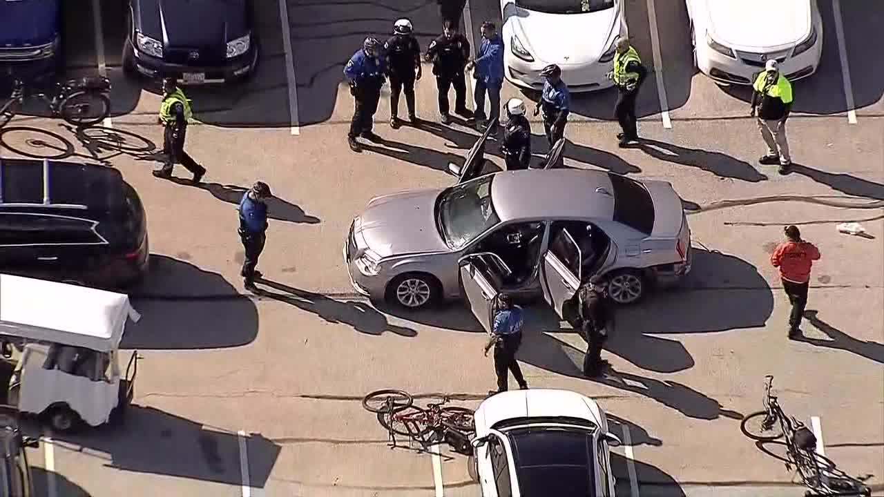 Man arrested after firing shots during parking lot fight near Rangers ...