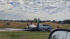 Plane goes off runway, crashes into car during emergency landing in McKinney